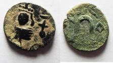 Ancient Coins - TINY FLAN: ISLAMIC. Ummayad caliphate (AD 661-750). Pseudo-Byzantine series. AE fals (14mm, 1.52g). Uncertain mint.