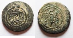 World Coins - ISLAMIC. Umayyad Caliphate. Anonymous. Arab-Sasanian series. AE pashiz (19mm, 3.49g). DA (Darabgird) mint. Struck in AH 72 (AD 691/2).
