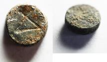 Ancient Coins - GREEK. Ancient Near East. AR obol blank(?) (9mm, 0.41g). Inscribed with monogram composed of Δ and Y / blank.