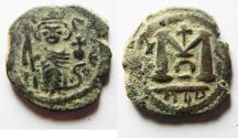 World Coins - ISLAMIC. Umayyad Caliphate. Arab-Byzantine series. AH 41-77 / AD 661-697. AE fals (19mm, 3.92g). Dimashq (Damascus) mint.  
