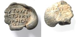 Ancient Coins - Roman Egypt. 1st-3rd century AD. Lead seal impression (19mm). AVTOVPI/AC TOV KVP/OV KAICAP/OC.