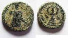 World Coins - ISLAMIC, Umayyad Caliphate. temp. 'Abd al-Malik ibn Marwan. AH 65-86 / AD 685-705. Æ Fals. Standing Caliph type. Amman mint. Struck circa AH 73-78 (AD 693-697)