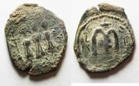 Ancient Coins - Unpublished: ISLAMIC. Umayyad Caliphate. Time of Mu'awiya I ibn Abi Sufyan (AH 41-60 / AD 661-680). Arab-Byzantine series. AE fals (25mm, 3.63g).  Uncertain mint (Tabariyya or Bays
