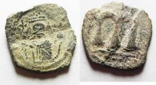 World Coins - 	ISLAMIC. Umayyad Caliphate. Arab-Byzantine AE fals . Pseudo-Damascus Mint. Struck c. AD 685-690.