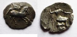 Ancient Coins - Greek. Uncertain Mint. AR obol (11mm, 0.36). Pegasos galloping r./ Female figure seated r., holding scepter and extending hand. BMC -; SNG Copenhagen -.