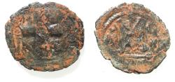 Ancient Coins - ISLAMIC. Ummayad caliphate. Arab-Byzantine series. AE fals (32mm, 7.77g). Baysan (Scythopolis mint). Struck c. AD 650-700.