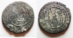 World Coins - ISLAMIC. Umayyad Caliphate. Anonymous. Arab-Sasanian series. AE pashiz (21mm, 3.46g). DA (Darabgird) mint. Struck in AH 72 (AD 691/2).