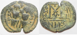 World Coins - SLAMIC. Umayyad Caliphate. Pre-Reform period (AH 41-77 / AD 661-669) AE fals. Arab-Byzantine series. Scythopolis (Beysan) mint.