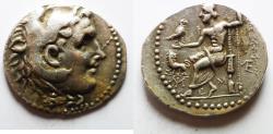 Ancient Coins - Unpublished Arab imitation with Shams?: Macedonian Kings. Alexander III the Great (336-323 BC). AR tetradrachm (32mm, 16.75g). Imitation of a posthumous issue of Miletos. Struck c.