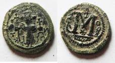 Ancient Coins - ISLAMIC. Umayyad Caliphate. Time of Yazid I ibn Mu’awiya (AH 60-64 / AD 680-683). Arab-Byzantine series. AE fals (21mm, 4.52g). Dimashq mint.