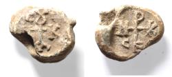 Ancient Coins - Byzantine. 7th century AD. Lead bulla (20mm, 7.8 g). Cruciform monogram