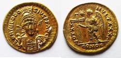 Ancient Coins - Roman Imperial. Theodosius II (AD 402-450). AV solidus (20mm, 3.83g). Constantinople mint, 4th officina. Struck AD 408-420.