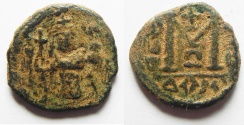 World Coins - ISLAMIC. Ummayad caliphate. Arab-Byzantine series (c. AD 650-700). AE fals (18mm, 3.57g). Dimashq mint. 