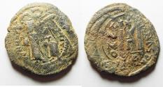 Ancient Coins - BYZANTINE EMPIRE. CONSTANS II OVER STRUCK ON A JUSTINIAN I BRONZE FOLLIS
