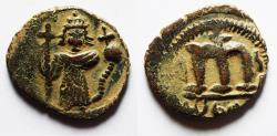 World Coins - ISLAMIC. Ummayad caliphate. Arab-Byzantine series. AE fals . al-Wafa Lillah mint. Struck c. AD 650-700
