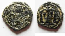 World Coins - HIGH QUALITY: SLAMIC, Umayyad Caliphate. temp. Mu'awiya I ibn Abi Sufyan. AH 41-60 / AD 661-680. Æ Fals