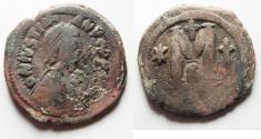 Ancient Coins - Apparently unpublished with star in legend: BYZANTINE. Justinian I (525-565). AE follis (30mm, 15.93g). Constantinople mint. Struck 537-538.