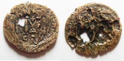 World Coins - ARAB-BYZANTINE. AE FALS IMITATING JUSTIN II FOLLIS. NYSA-SCYTHOPOLIS