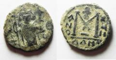 Ancient Coins - AS FOUND: ISLAMIC, Umayyad Caliphate (Arab-Byzantine coinage). Circa 680s. Æ Fals . Dimashq (Damascus) mint.