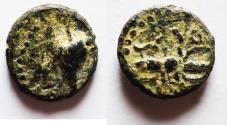Ancient Coins - Judaea. Caesarea Maritima. First century AD. AE minima (11mm, 1.24g). Grape bunch/ thunderbolt. Apparently unpublished.