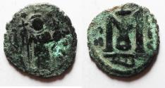 World Coins - Islamic. Umayyad Caliphate. Time of Mu'awiya ibn Abi Sufyan (AH 41-60/ AD 661-680). Pre-reform Arab-Byzantine series. AE fals (19mm, 2.82g).
