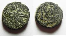 Ancient Coins - ISLAMIC, Umayyad Caliphate. temp. 'Abd al-Malik ibn Marwan. AH 65-86 / AD 685-705. Æ Fals. Standing Caliph type. Amman mint. Struck circa AH 73-78 (AD 693-697)