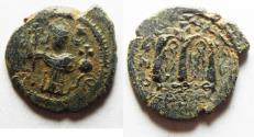 World Coins - ISLAMIC. Umayyad Caliphate. Arab-Byzantine AE fals (18mm, 3.03g). Pseudo-Damascus Mint. Struck c. AD 685-690.
