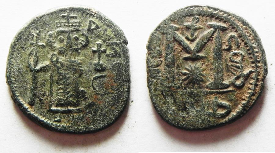 World Coins - ISLAMIC, Umayyad Caliphate. temp. Mu'awiya I ibn Abi Sufyan. AH 41-60 / AD 661-680. Æ Fals . damascus mint
