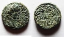 Ancient Coins - JUDAEA, Herodians. Agrippa II, with Domitian. Circa 50-100 CE. Æ 14MM. Caesarea Paneas mint. Dated year 35 of the first era of Agrippa II (83/4 CE).