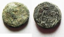 Ancient Coins - JUDAEA, Herodians. Agrippa II, with Domitian. Circa 50-100 CE. Æ 14MM. Caesarea Paneas mint. Dated year 35 of the first era of Agrippa II (83/4 CE).