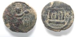 World Coins - Islamic. Time of the Rashidun. Circa AH 37-55 / AD 658-675. Ae fals (17mm, 3.05g). Uncertain mint.