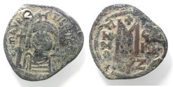 Ancient Coins - BYZANTINE. COUNTERMARKED MAURICE TIBERIUS AE FOLLIS