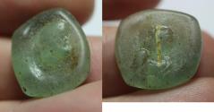 Ancient Coins - Roman Near East. Second-third century AD. Green glass double-sided tessera.