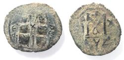 World Coins - ISLAMIC. Umayyad Caliphate. Arab-Byzantine series. AE fals (30mm, 8.72g). Abila mint. Struck c. AH 41-77 / AD 661-697.
