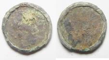 Ancient Coins - ROMAN PROVINCIAL. AE 17mm, 2.01g in silver mount. Possibly a coin or flan (no types are visible) mounted in a silver collar for use in ancient jewelry.
