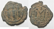 World Coins - ARAB-BYZANTINE AE FILS. TIBERIAS MINT. AS FOUND. CHOICE QUALITY