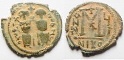 Ancient Coins - ISLAMIC. Ummayad caliphate. Arab-Byzantine series. AE fals (28mm, 6.36g). Baysan (Scythopolis) mint. Struck c. AD 650-700.