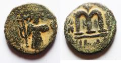 World Coins - Zurqieh ISLAMIC. Ummayad caliphate. Arab-Byzantine series. AE fals (18mm). "al-Wafa Lillah" mint. Struck c. AD 650-700.