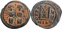 Ancient Coins - EARLY ISLAMIC, Arab-Byzantine. In the style of Justin II. After 641 AD. Æ Follis.