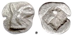 Ancient Coins - IONIA, Taos.  AR Tetartemorion, circa 500 BC.  Griffin