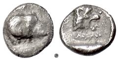 Ancient Coins - CARIA, Uncertain.  AR Tetartemorion, circa 400 BC.  Ram / Lion