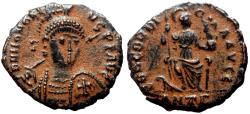 Ancient Coins - HONORIUS AE3 (Nummus). EF-. Antioch mint. The concordia.