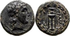 Ancient Coins - TRALLEIS (Lydia) AE19. VF+/EF-. Apollo - Tripod in wreath.