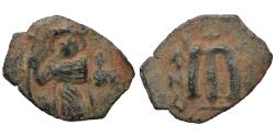 World Coins - Ummayad Caliphate Arab-Byzantine Standing Emperor type Circa 680s Æ Fals