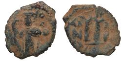 World Coins - Ummayad Caliphate. Arab-Byzantine coinage (Standing Emperor type). Circa 680s. Æ Fals.