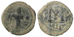 World Coins - Arab-Byzantine, Umayyad Caliphate, c. 680-700. Æ Fals Hims (Emesa)