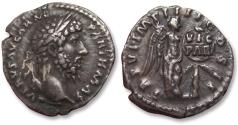 Ancient Coins - AR denarius Lucius Verus, Rome mint circa 166 A.D. - TR P VI IMP IIII COS II, Victory inscribing shield -