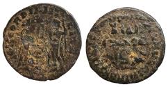 Ancient Coins - Umayyad AE fals overstruck on Roman coin