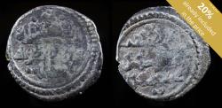 World Coins - Quirat Período Almorávide, Ali Ibn Yusuf (500-537 H) Vives 1703-13 mm / 0.69 gr.