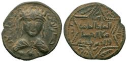 World Coins - ARTUQID of MARDIN. Husam al Din Yuluq Arslan. 1184-1201 AD. No mint. 586 AH. AE Dirhem